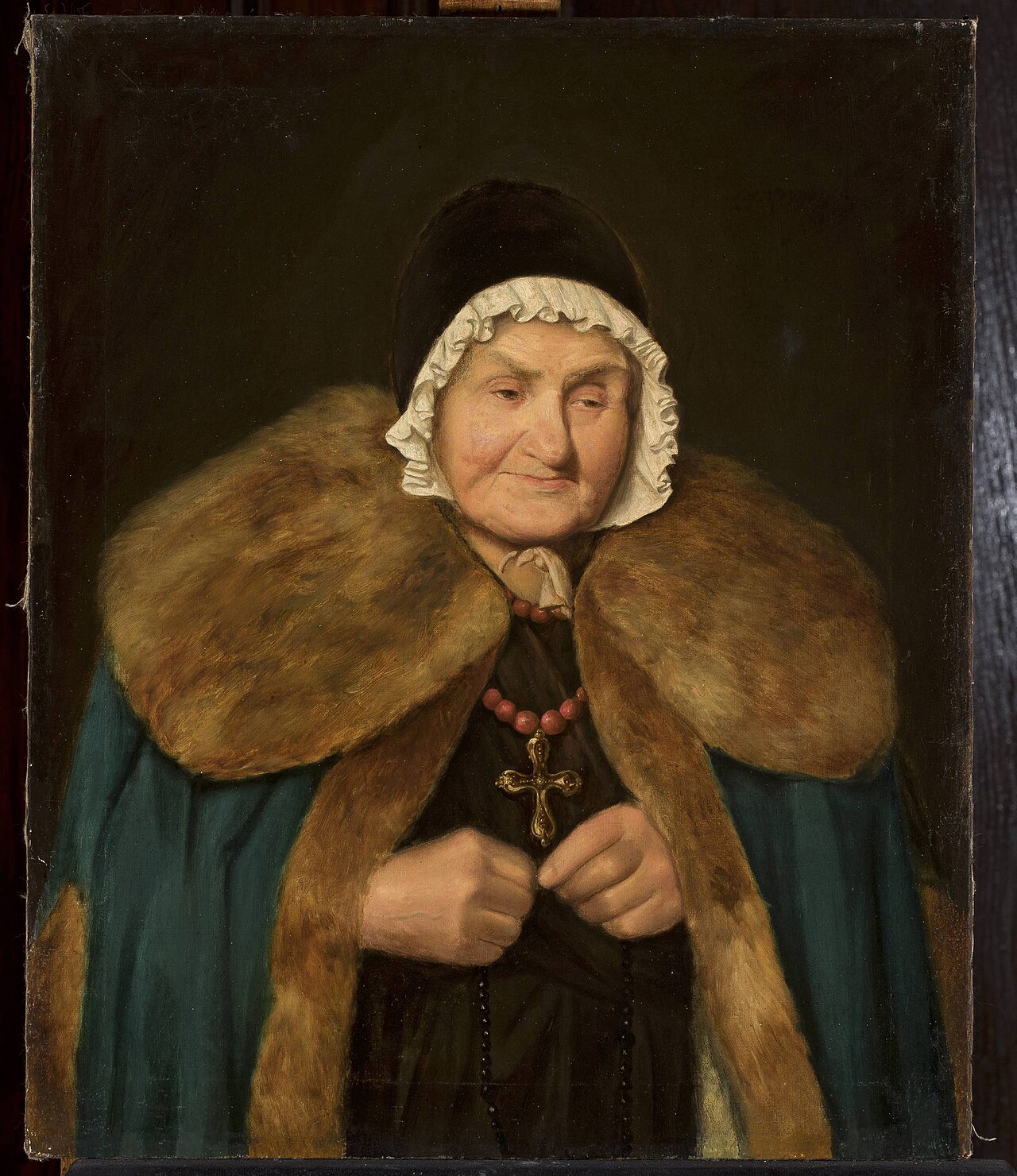 The Old woman with a rosary. by Aleksander Kotsis