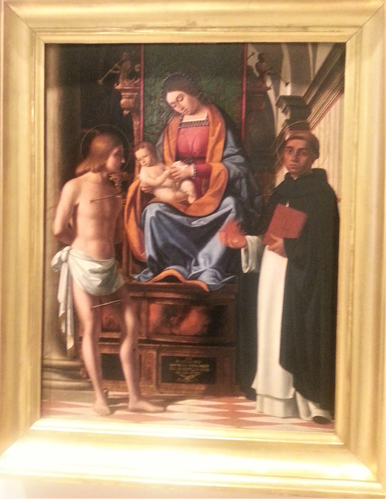 Madonna and Child enthroned between Saints Sebastian and Vincenzo Ferrer by Andrea Previtali