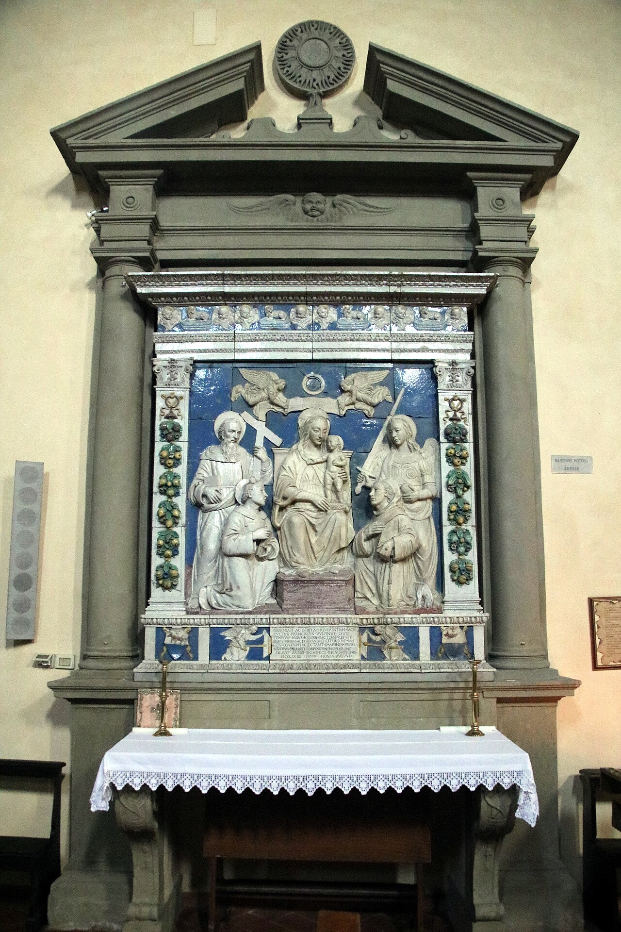 Madonna and Child with Four Saints by Benedetto Buglioni
