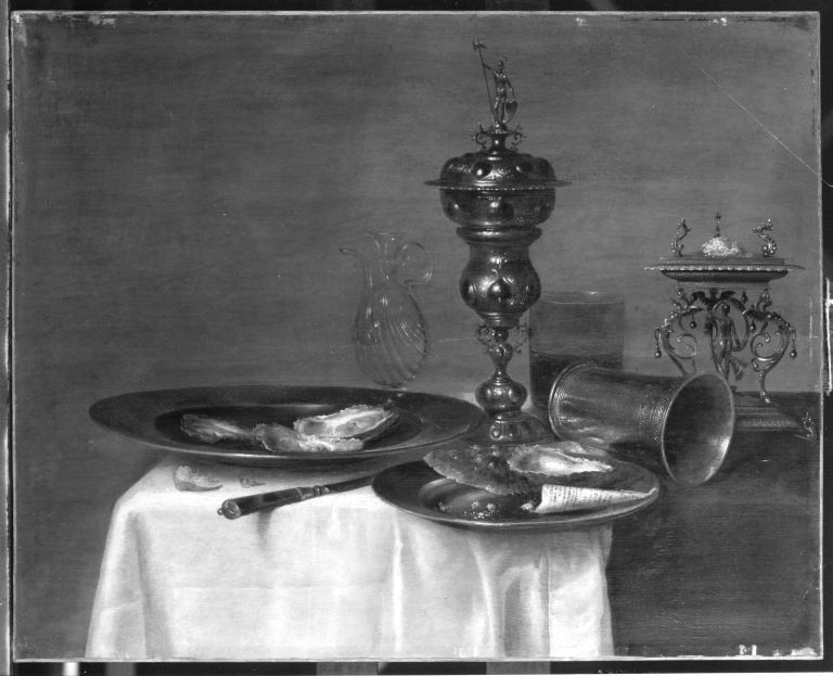Still life with fallen silver beaker, oysters and gilt columbine cup by Cornelis Mahu