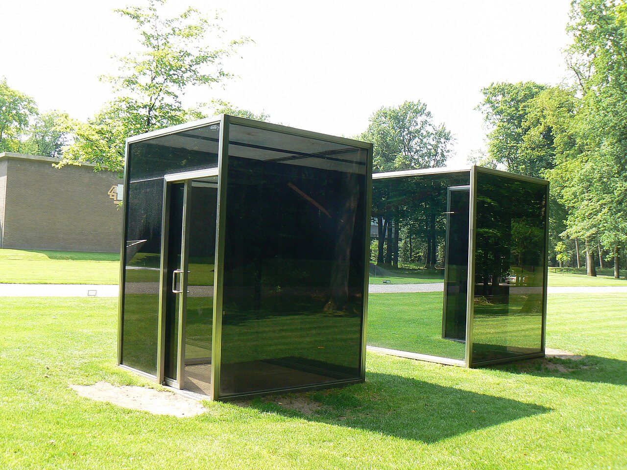 Two adjacent pavilions by Dan Graham