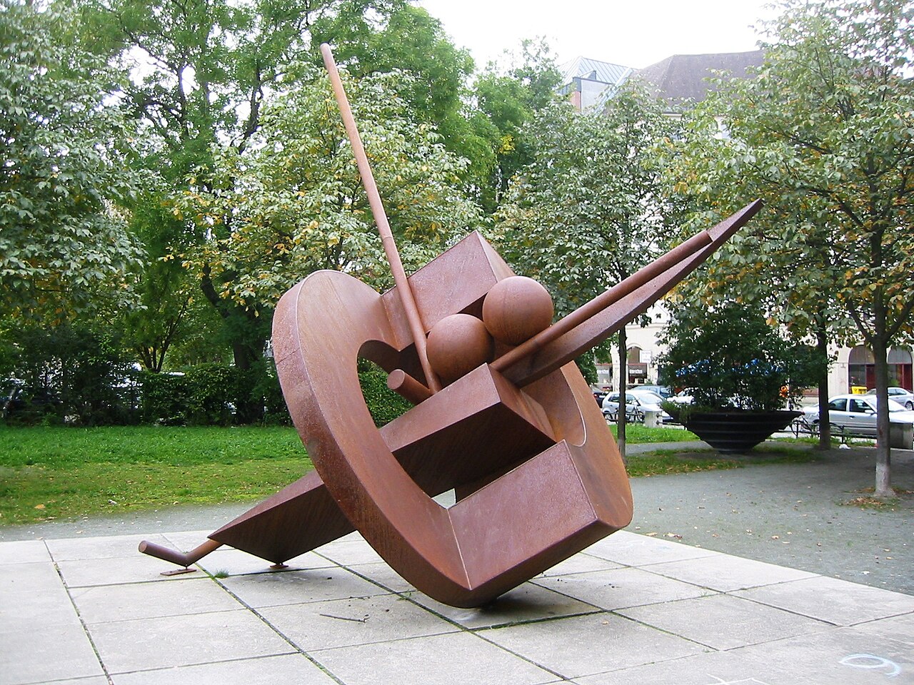 Tilted Donut Wedge with Two Balls by Fletcher Benton