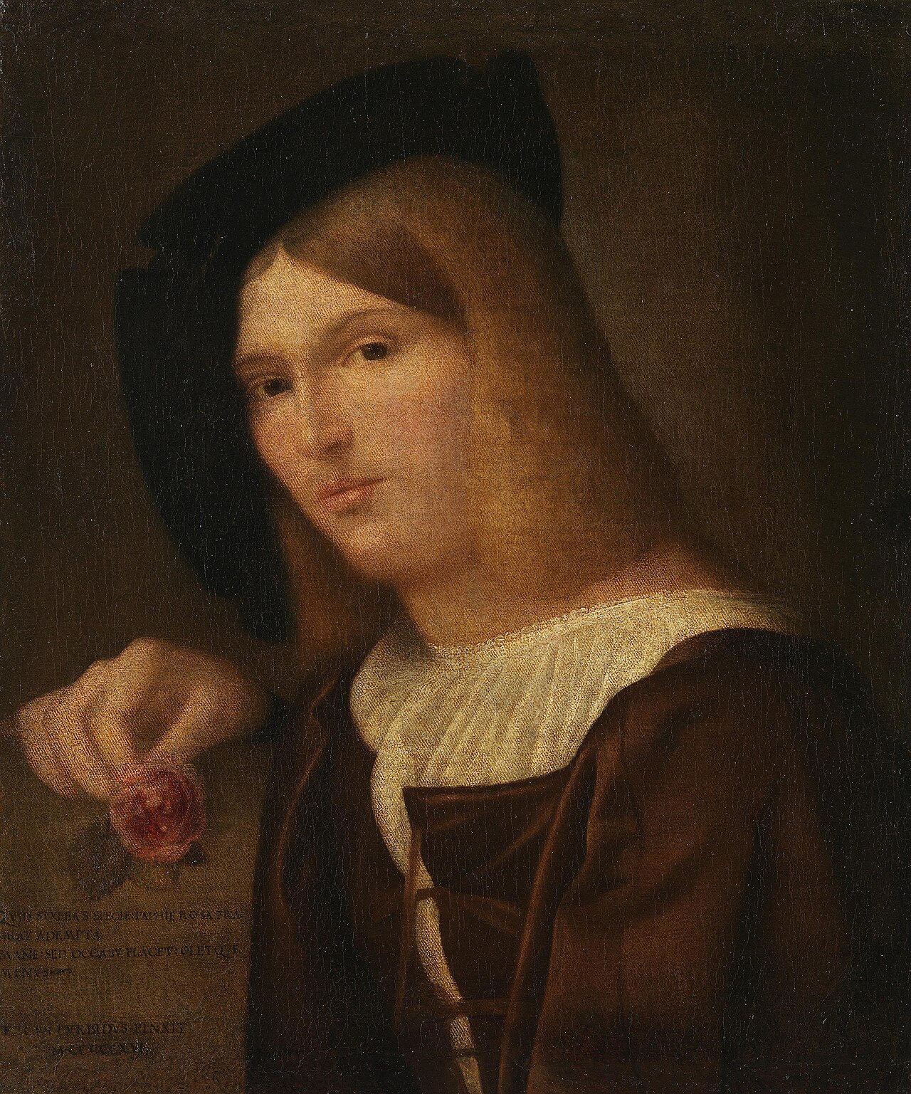Portrait of a young man with a rose in his hand by Francesco Torbido
