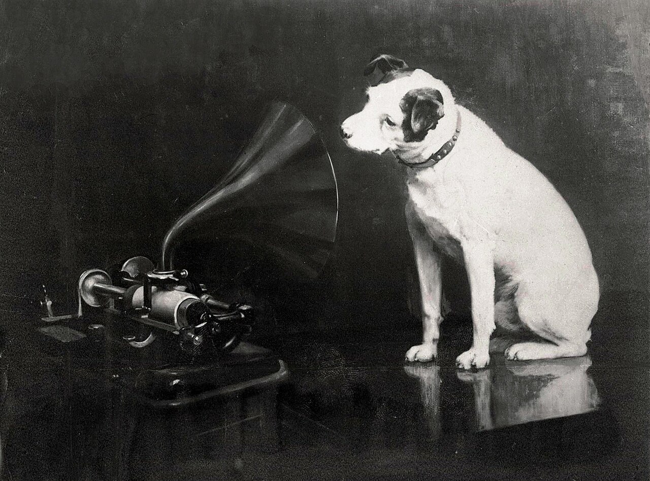 Dog looking at and listening to a phonograph by Francis Barraud