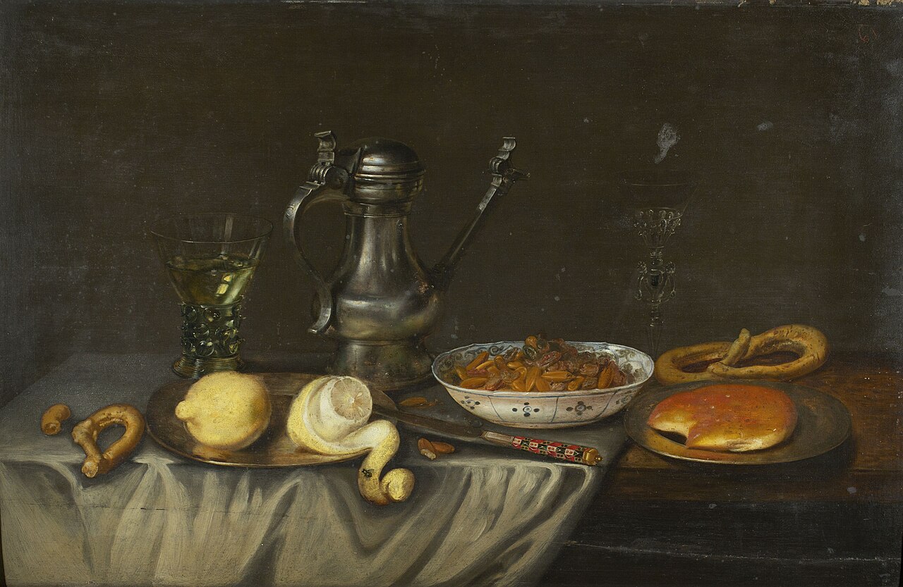 Still life with bread, nuts and lemons by Frans Ykens
