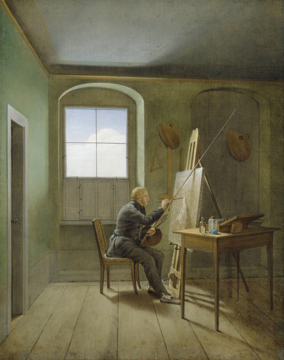 Caspar David Friedrich in his Studio (1811) by Georg Friedrich Kersting