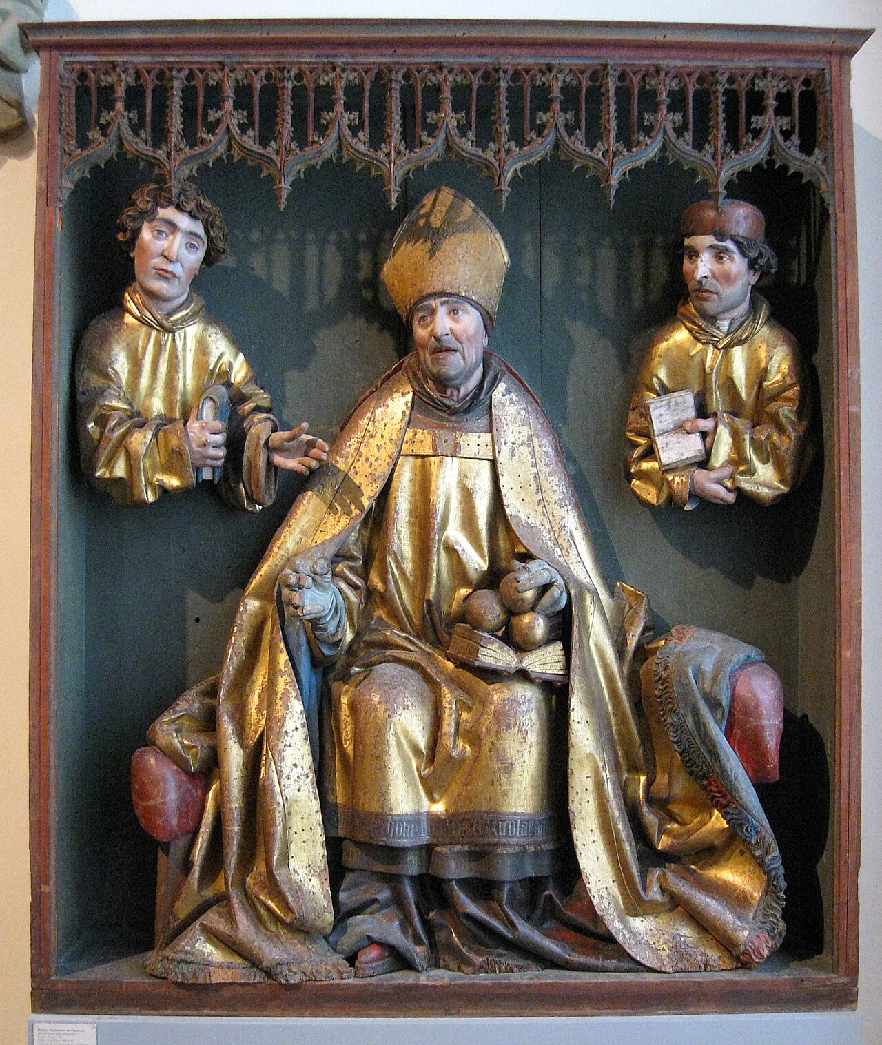Saint Nicholas and busts of two deacons by Gregor Erhart