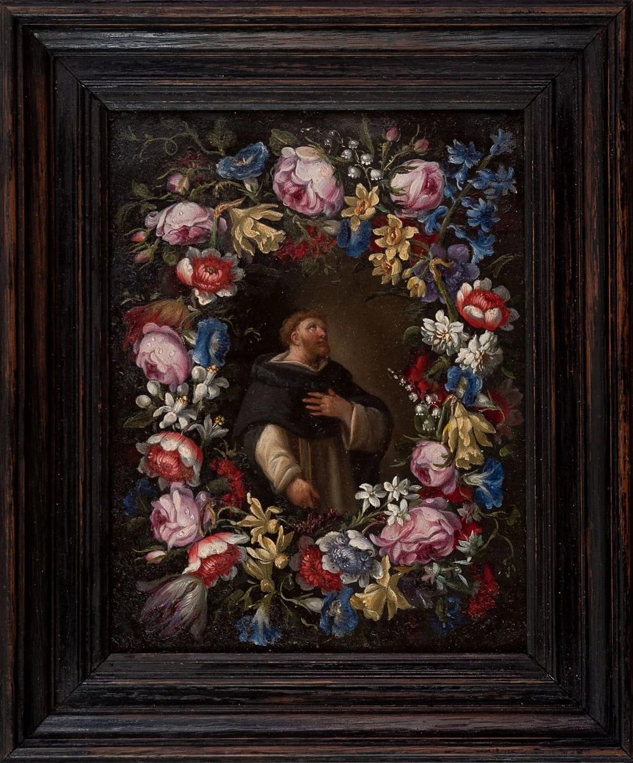 Monk in a flower wreath by Jan Pieter Brueghel