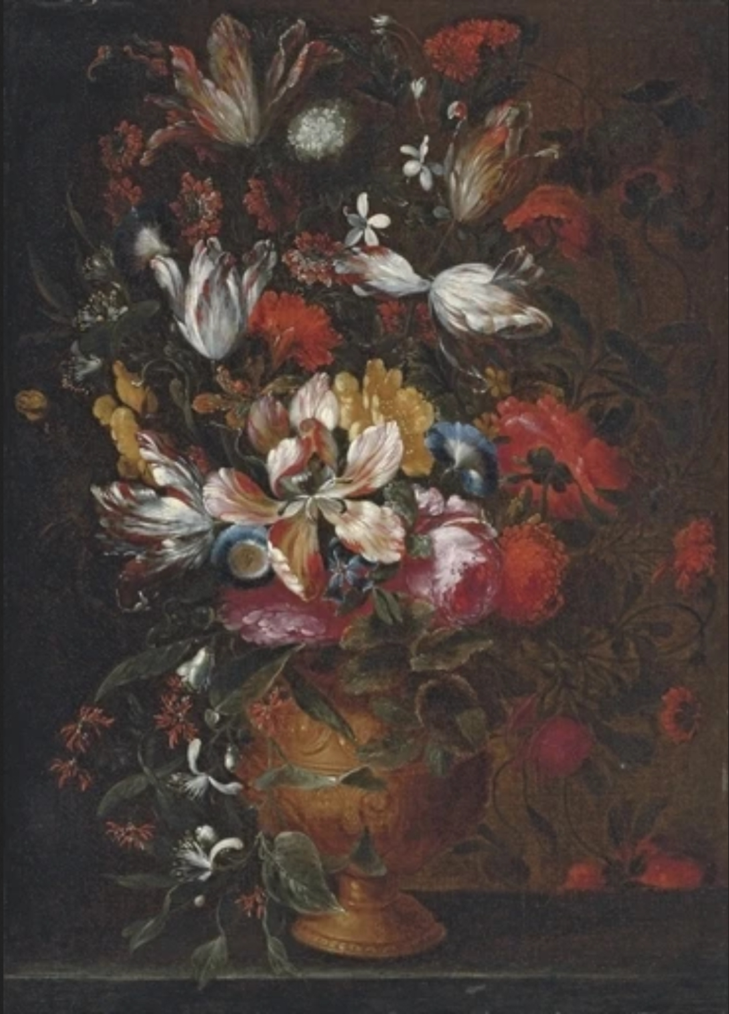 Roses, tulips, irises and other flowers in a bronze urn on a stone ledge by Jan Pieter Brueghel