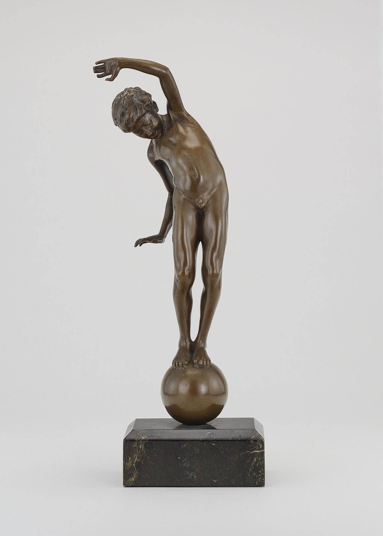 Boy Balancing on a Ball by Johannes Götz