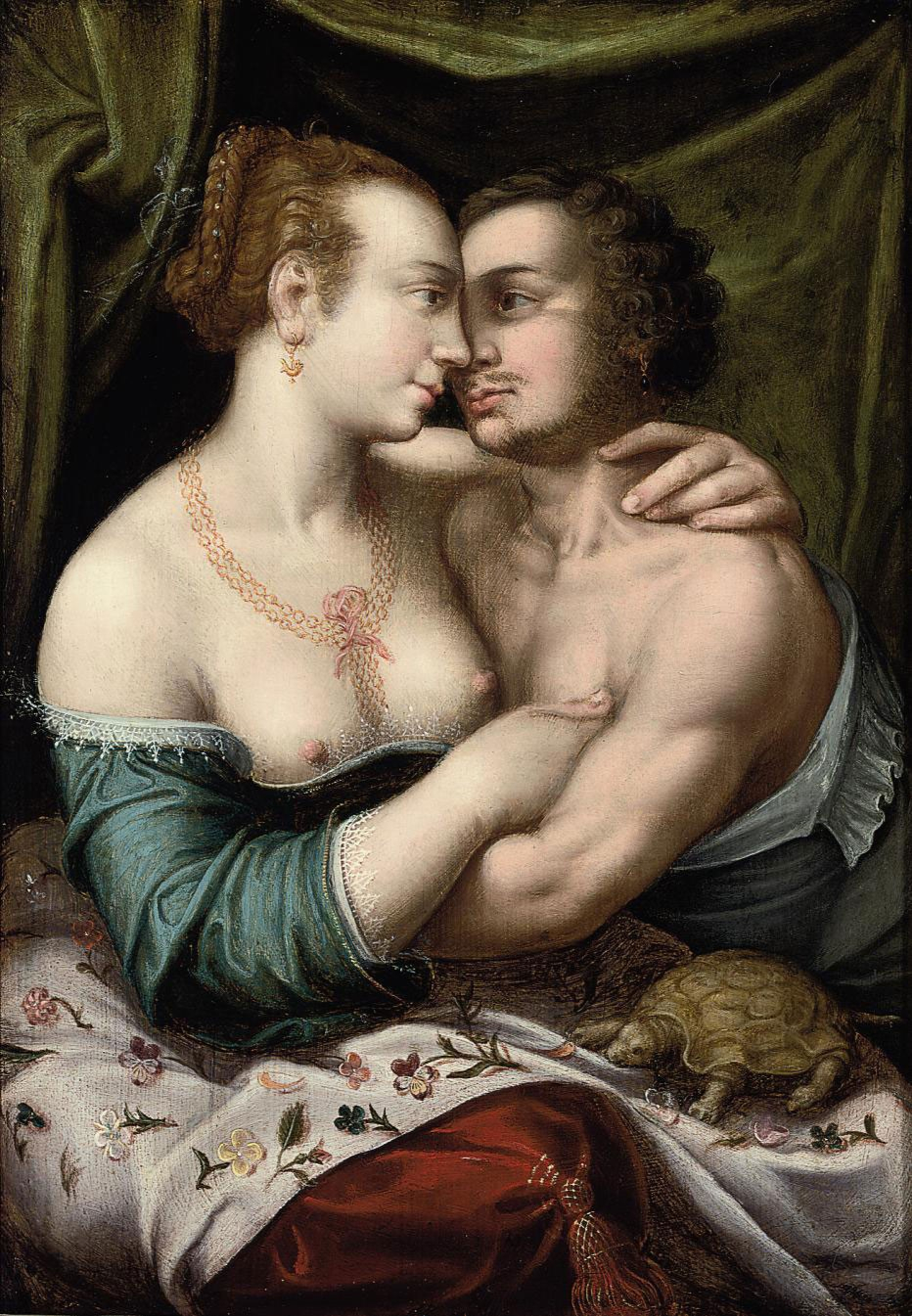 An amorous couple in an interior with a tortoise by Joos van Winghe