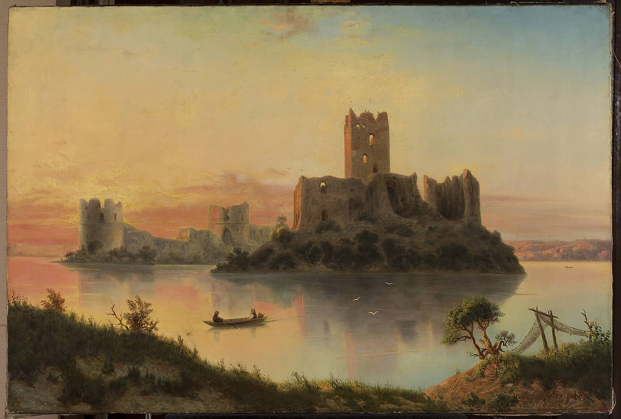 The ruins of the Trakai Castle at sunset. by Józef Marszewski