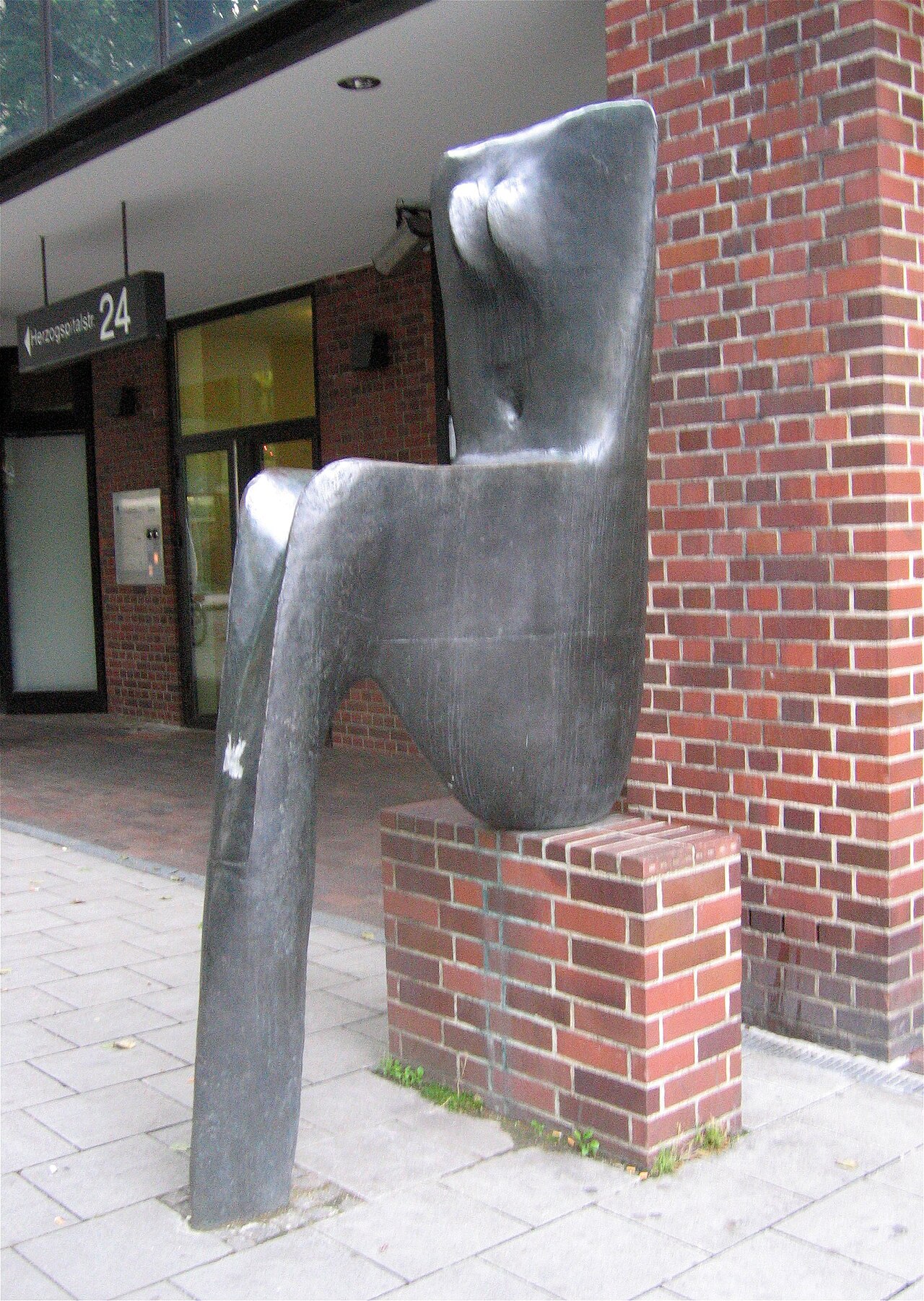 Large sitting female torso by Lothar Fischer