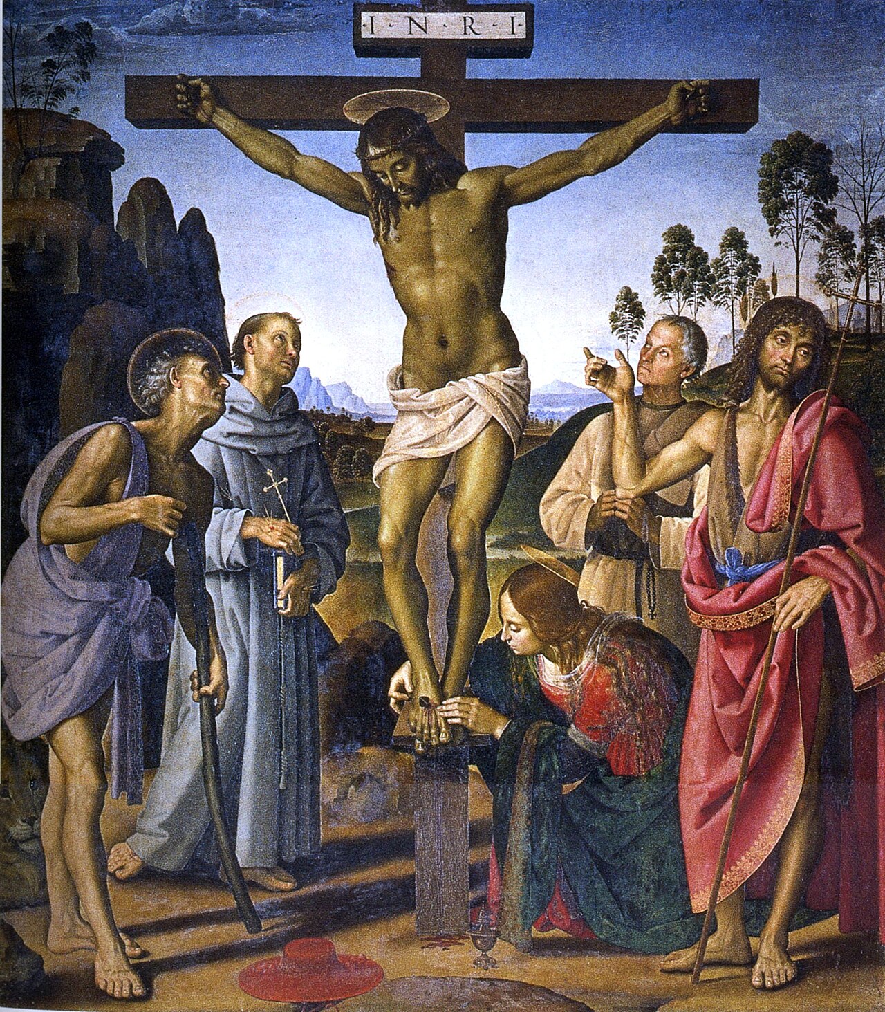 Crucifixion of Christ with saints by Luca Signorelli