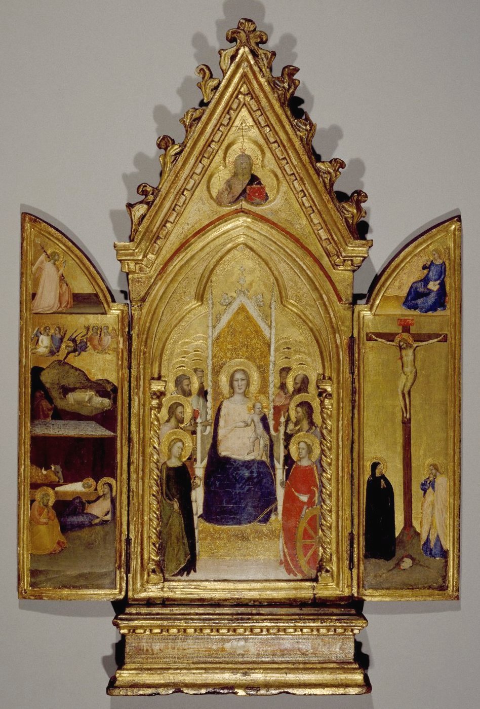 Triptych: Madonna with Saints and Christ Blessing (Center); The Nativity and the Annunciate Angel (Left Wing); Crucifixion and the Virgin Annunciate (Right Wing) by Maso di Banco