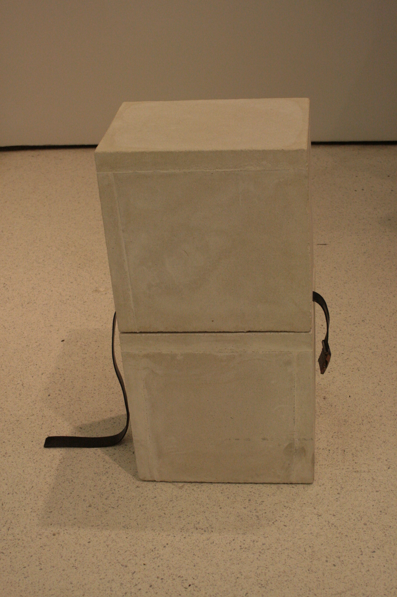 Rubber, concrete, leather, and steel. by Mirosław Bałka