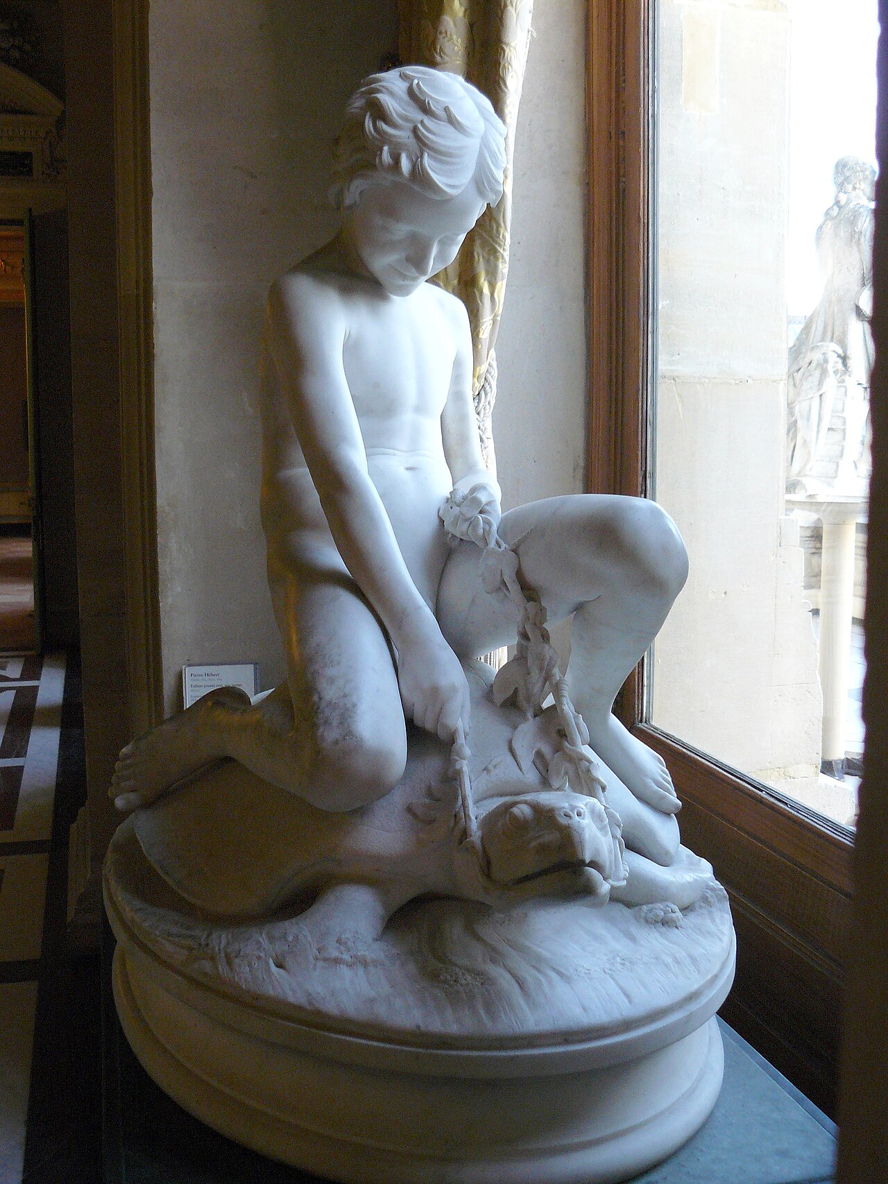 Child playing with a turtle by Pierre Hébert
