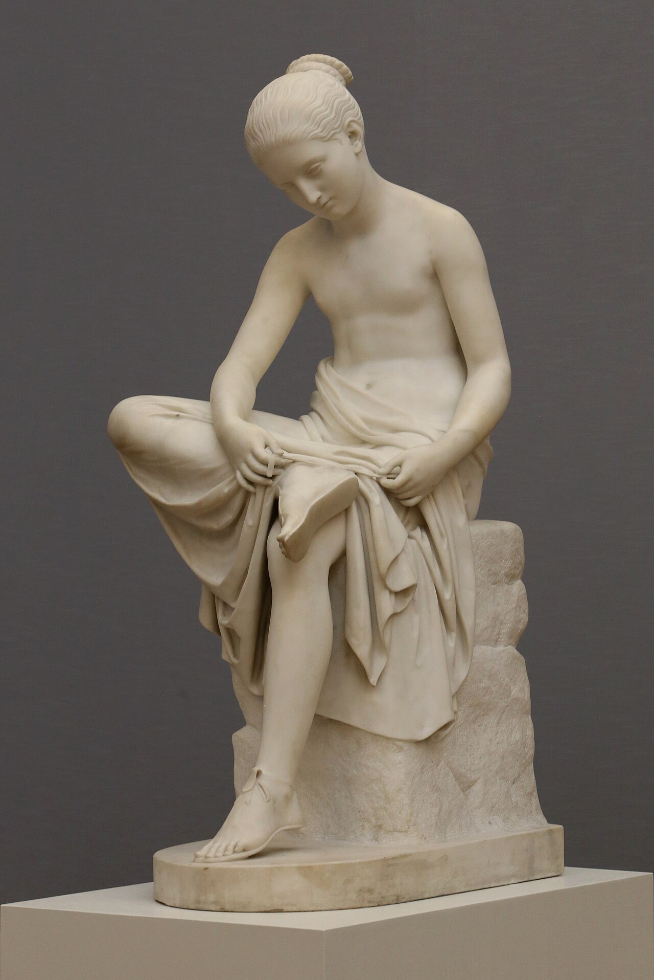 Woman Tying her Sandal by Rudolph Schadow