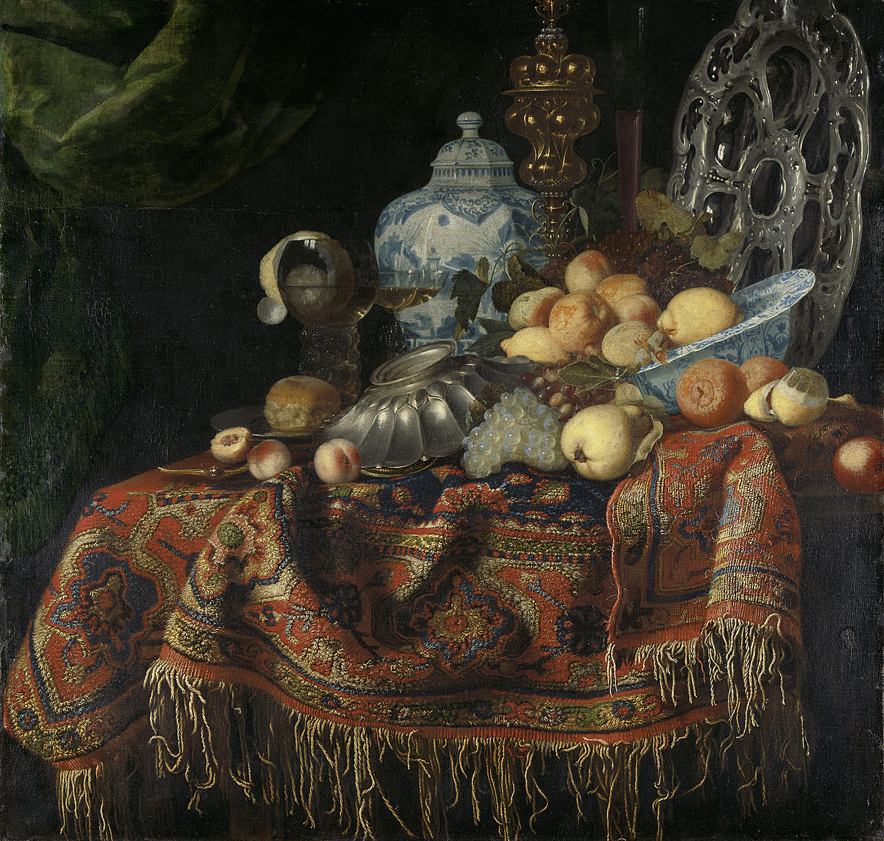 Still Life with Fruit, Plates and Dishes on a Turkey Carpet by Simon Luttichuys