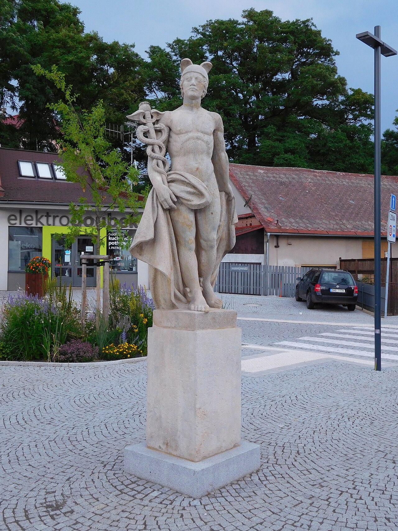 Statue of Mercurius in Nová Paka by Vojtěch Sucharda
